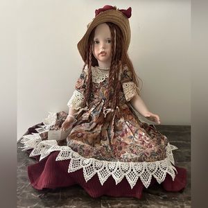 NEW AUTHENTIC PORCELAIN DOLL. Full porcelain body, Made in Venice, Italy. H:23".